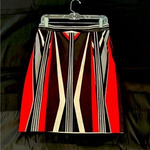 Red and black patterned skirt. Perfect for work or even a bridal shower/luncheon